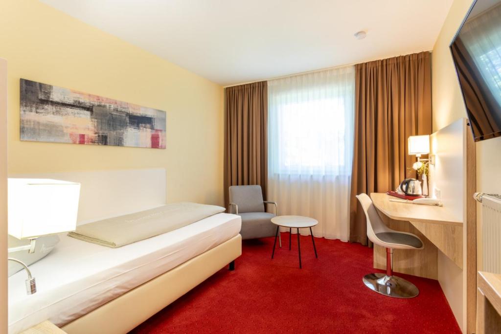 TV a/nebo společenská místnost v ubytování Hotel Montana