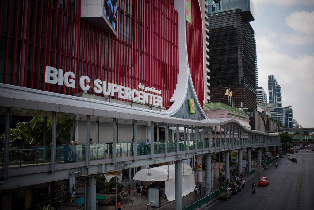 a bridge over a street in a city with buildings at The Berkeley Hotel Pratunam in Bangkok