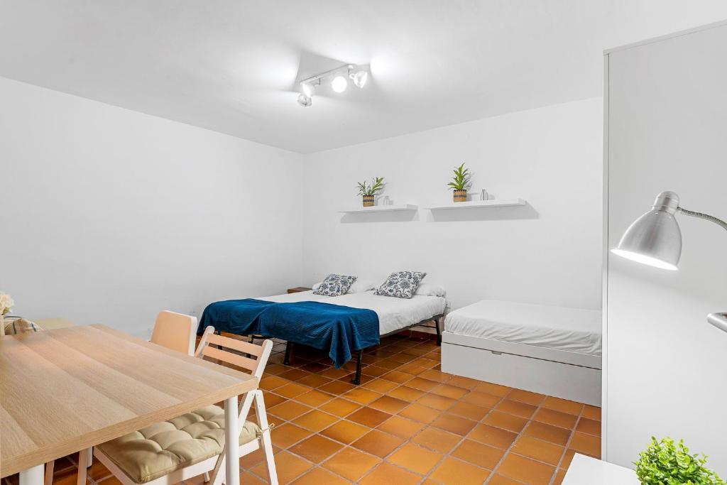 Postel nebo postele na pokoji v ubytování MEDANO4YOU Casa La Inglesa 5