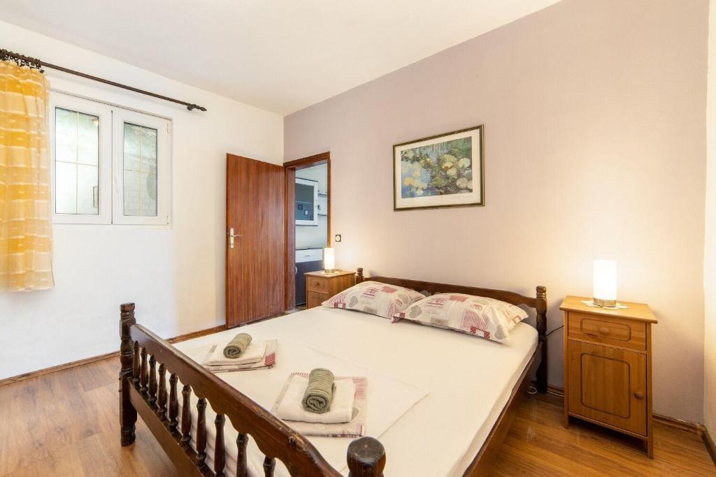Posteľ alebo postele v izbe v ubytovaní Apartments More