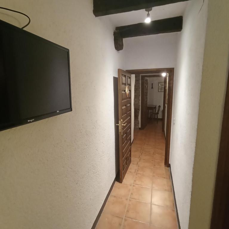 TV a/nebo společenská místnost v ubytování Apartaments Can Lo