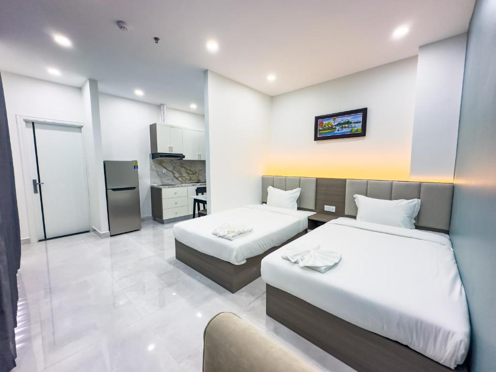 Postel nebo postele na pokoji v ubytování C-Hotel