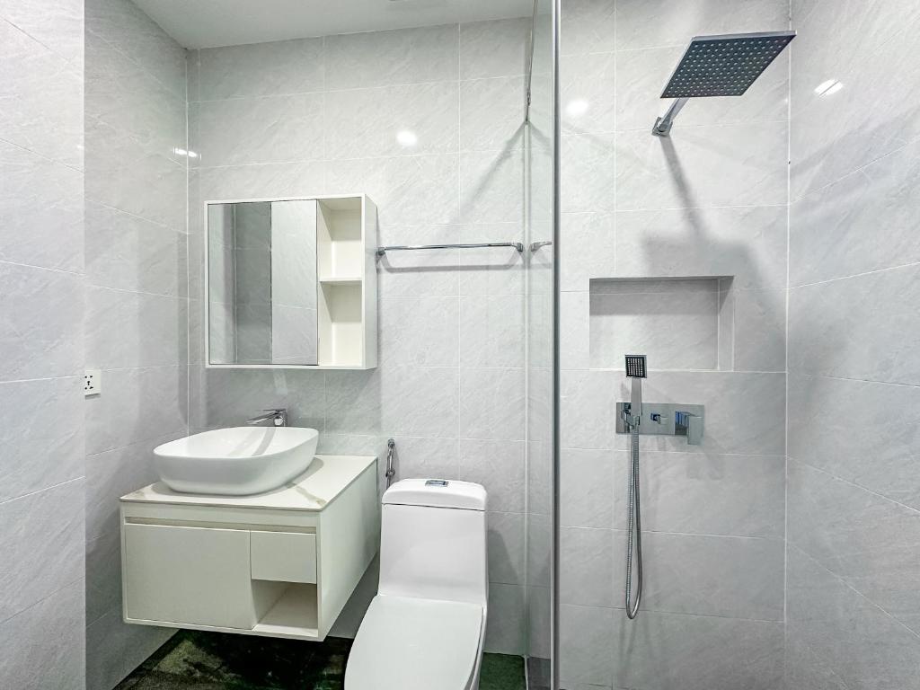 Koupelna v ubytování C-Hotel