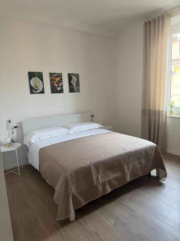 Postel nebo postele na pokoji v ubytování LINDA affittacamere