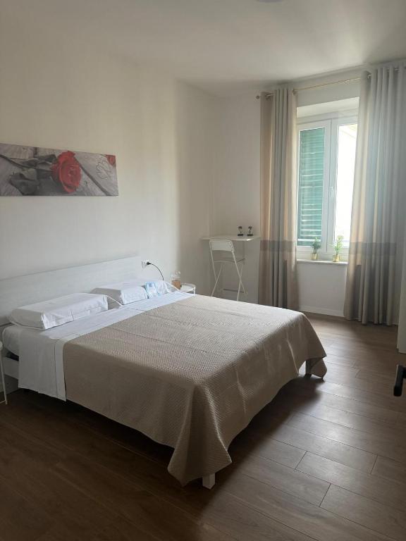 Postel nebo postele na pokoji v ubytování LINDA affittacamere