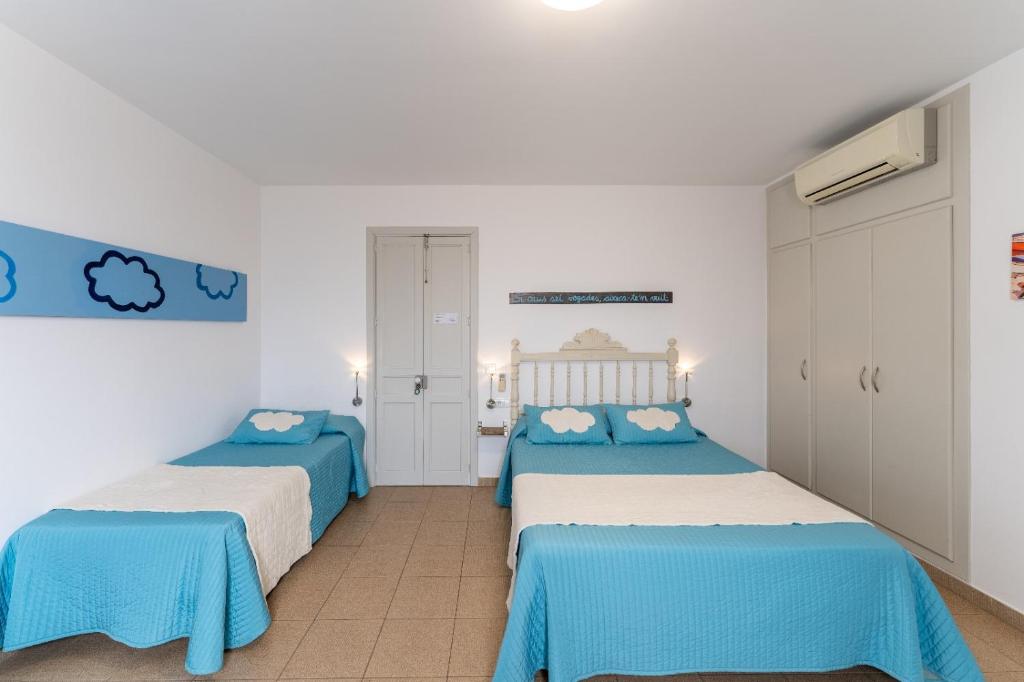 Postel nebo postele na pokoji v ubytování Can Salva amb Jacuzzi privat