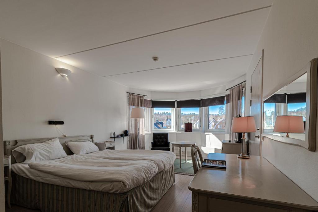 Postel nebo postele na pokoji v ubytování First Hotel Olofström