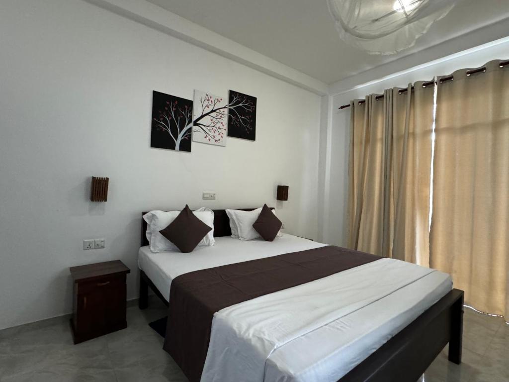 Letto o letti in una camera di Nico Beach Hotel