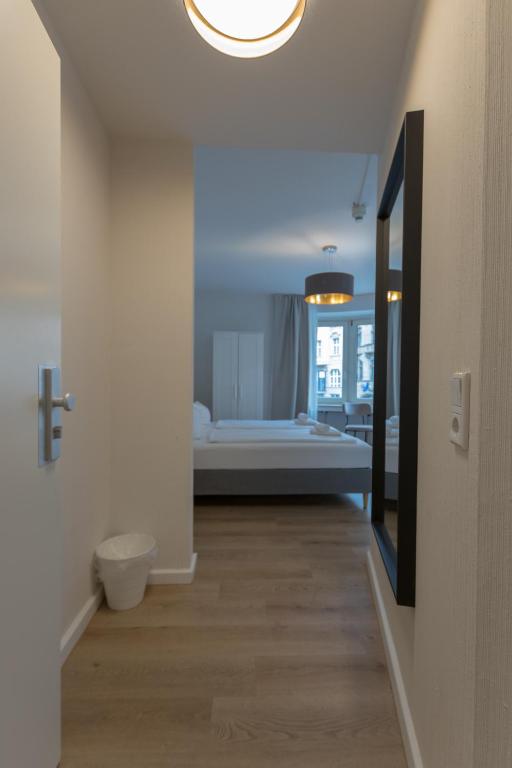 Postel nebo postele na pokoji v ubytování Hotel Doerenkamp - Digital Access