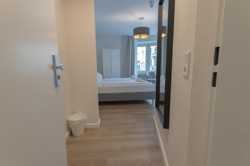 Postel nebo postele na pokoji v ubytování Hotel Doerenkamp - Digital Access
