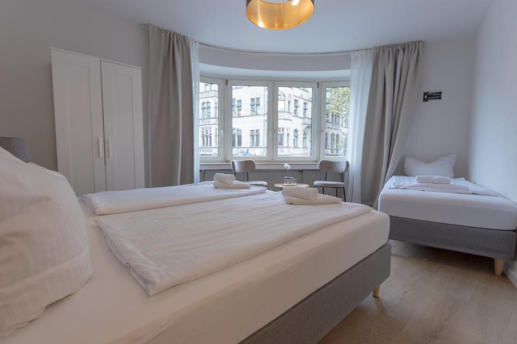 Postel nebo postele na pokoji v ubytování Hotel Doerenkamp - Digital Access