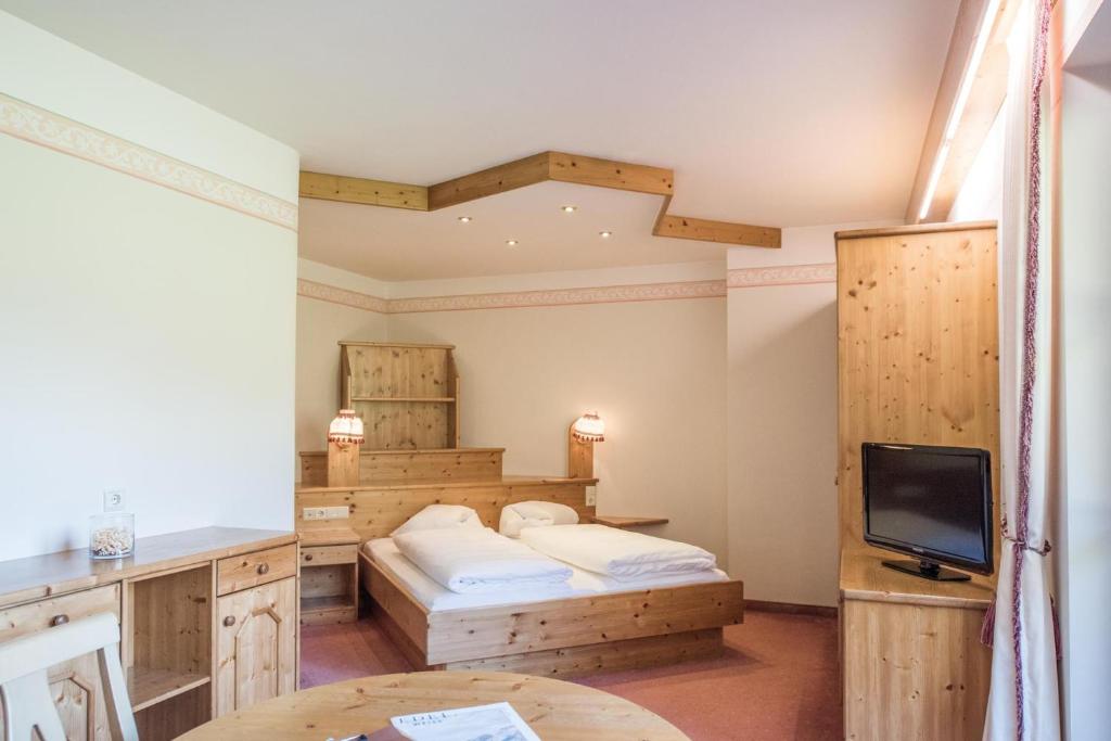 Postel nebo postele na pokoji v ubytování Hotel Edelweiss
