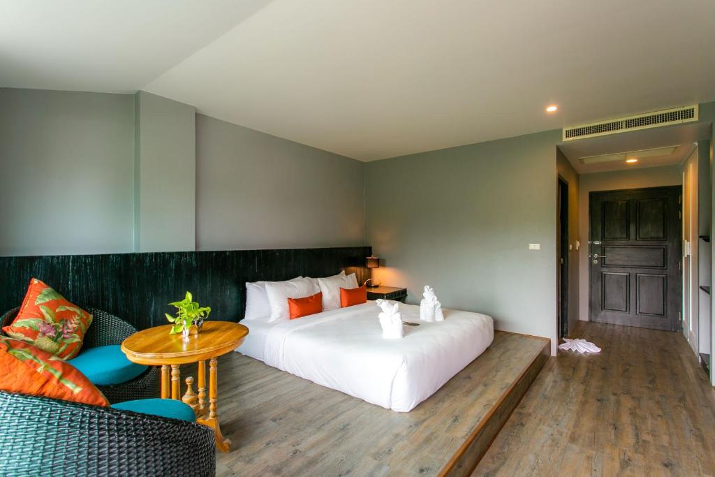 Postel nebo postele na pokoji v ubytování JALMIN Hotel Samui