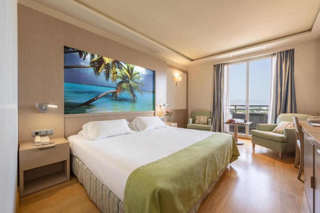 Postel nebo postele na pokoji v ubytování Hotel Nelva