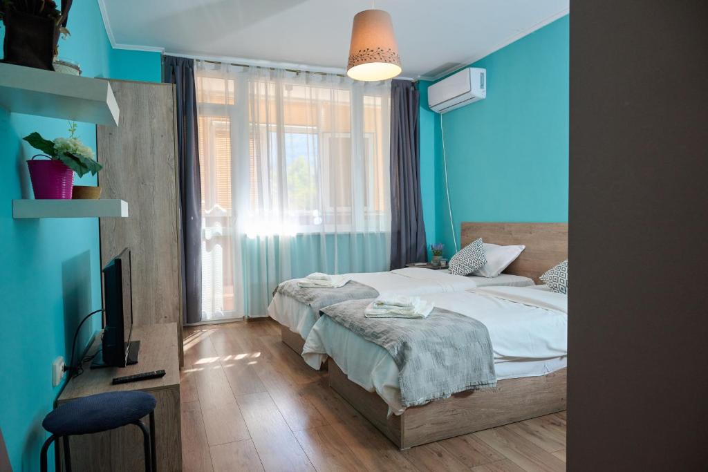 Postel nebo postele na pokoji v ubytování Center