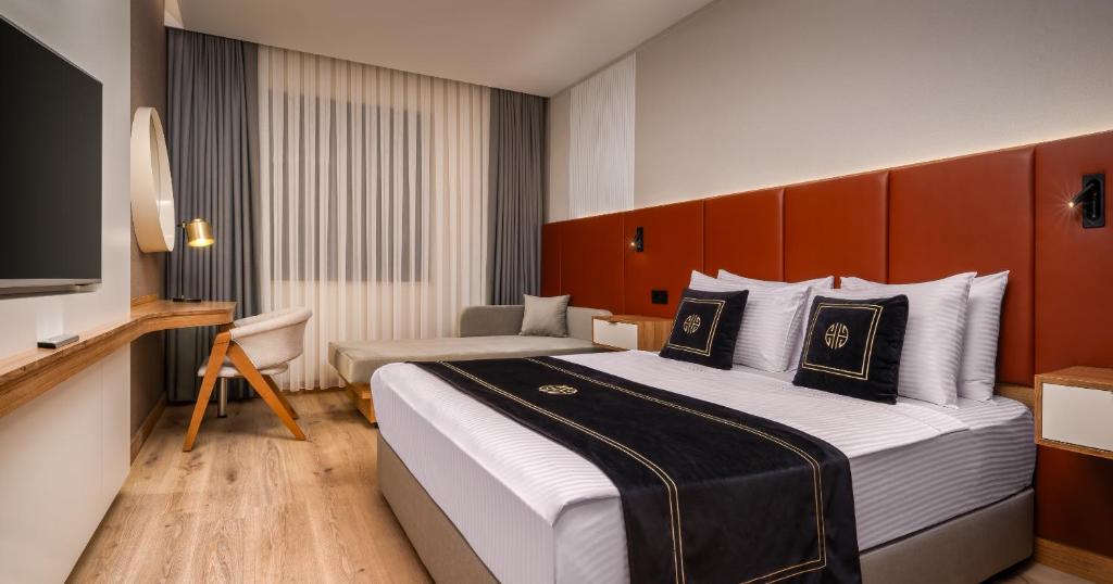 Postel nebo postele na pokoji v ubytování Best Western Premier Hidden Hills Hotel