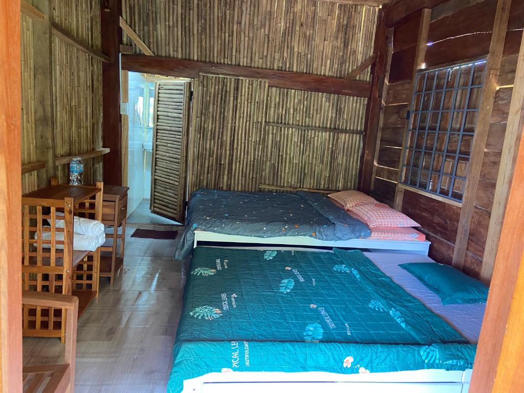 Postel nebo postele na pokoji v ubytování Gạo hạt dẻ homestay