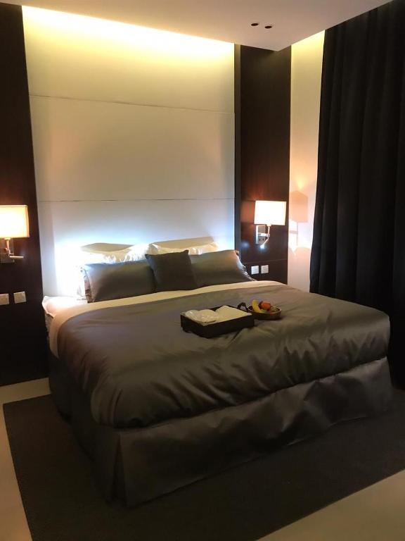 Postel nebo postele na pokoji v ubytování Dana Hotel Residence1