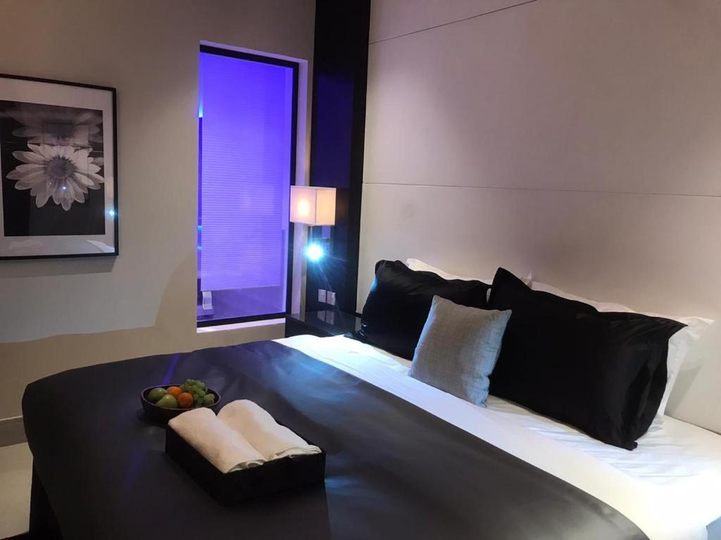 Postel nebo postele na pokoji v ubytování Dana Hotel Residence1