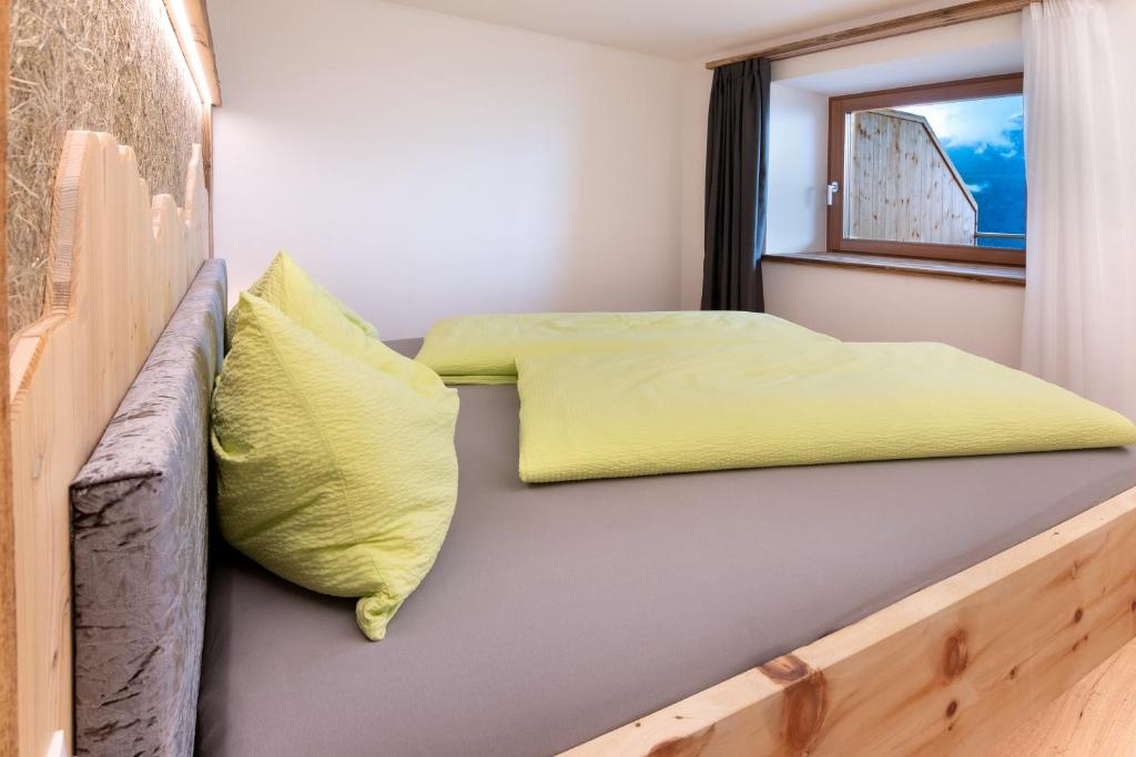 Postel nebo postele na pokoji v ubytování Gurschlerhof