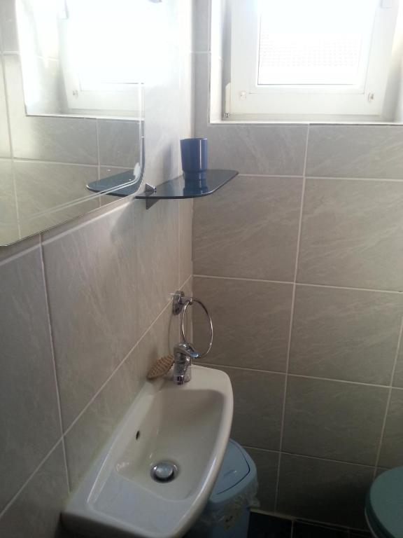 Kúpeľňa v ubytovaní Apartment Jevic