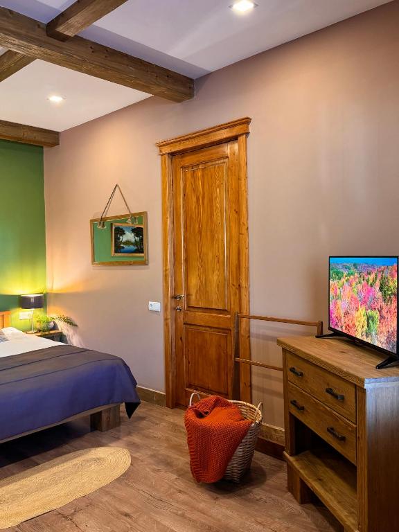TV a/nebo společenská místnost v ubytování Hotel Borjomi Verde
