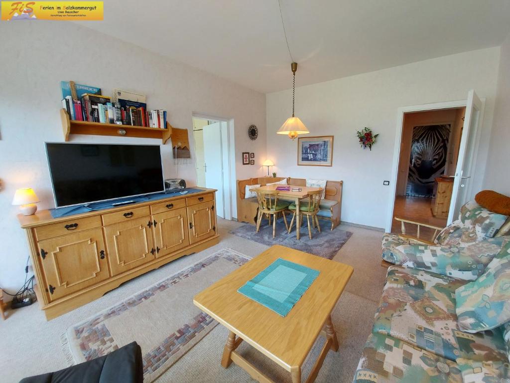 Televízia a/alebo spoločenská miestnosť v ubytovaní Apartment Ambiente
