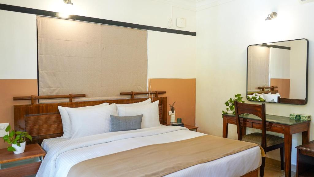 Postel nebo postele na pokoji v ubytování Olive Hotel Alidia Beach Resort by Embassy Group