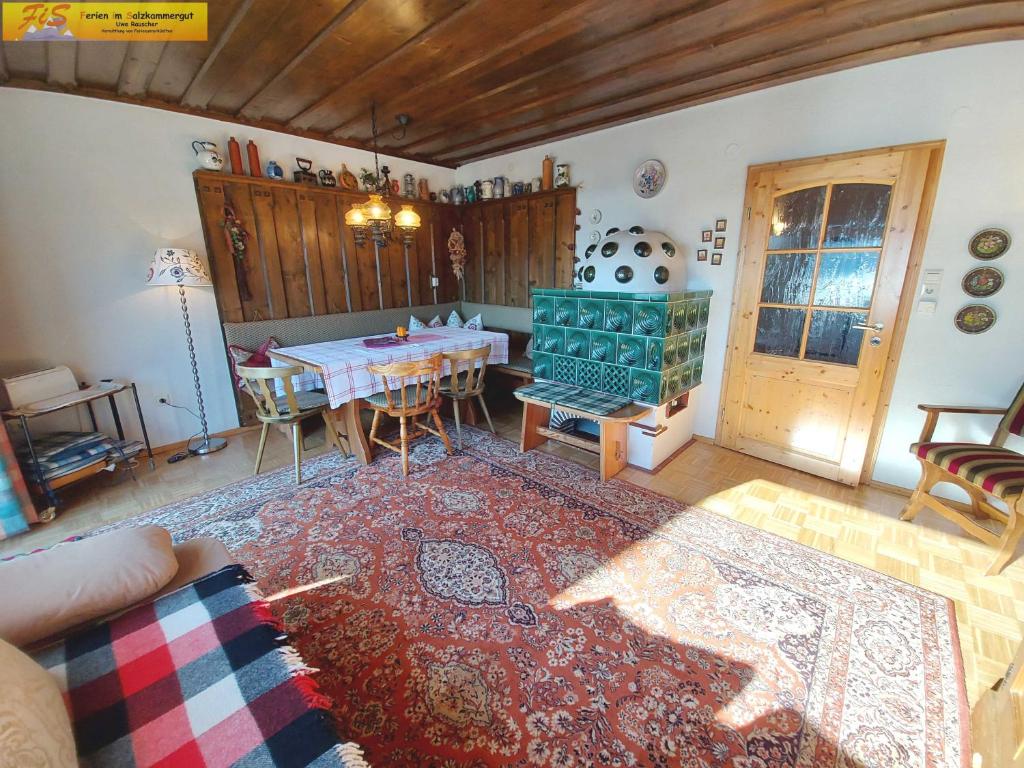 Posedenie v ubytovaní Ferienhaus Almrausch