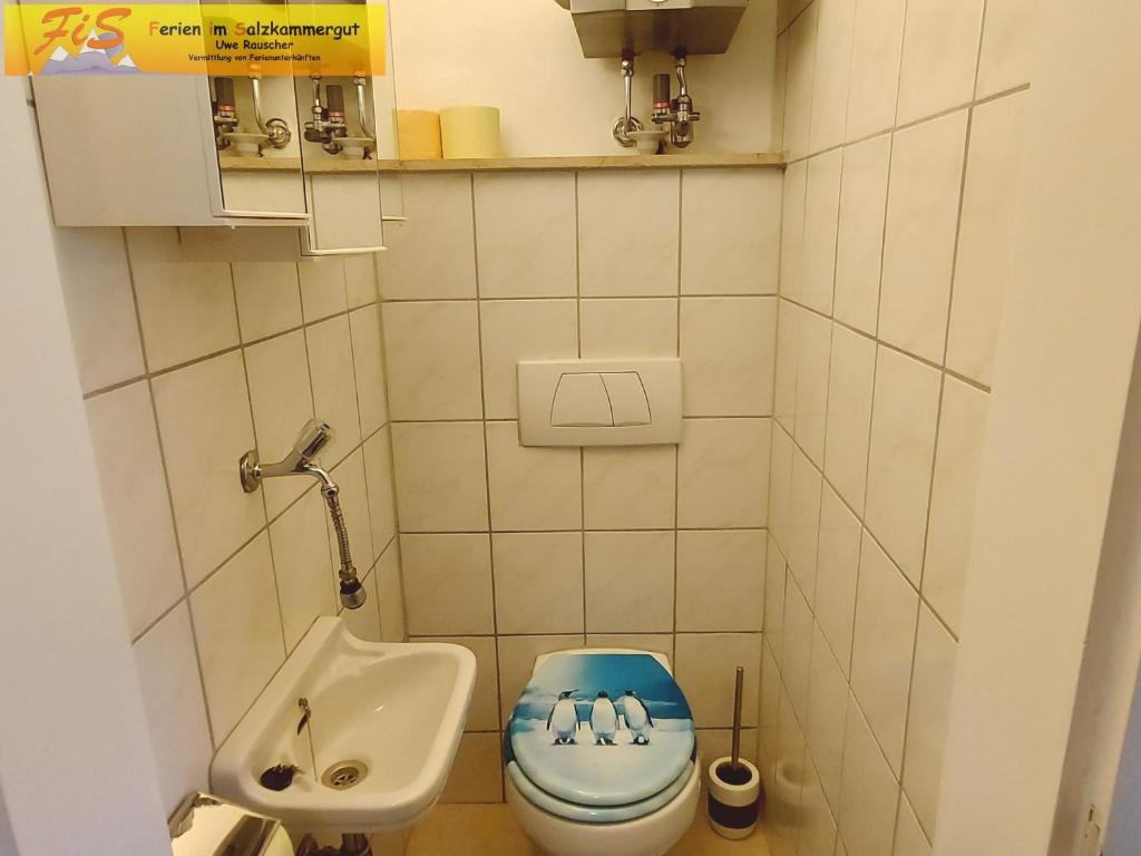 Koupelna v ubytování Haus André