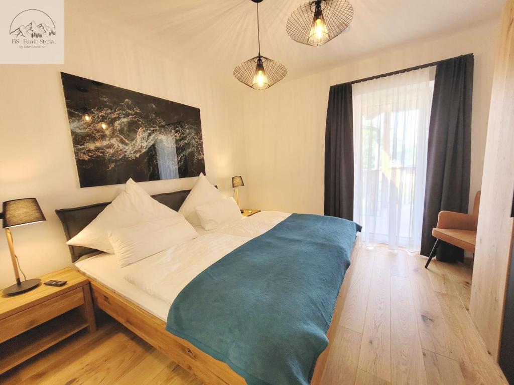 Postel nebo postele na pokoji v ubytování Penthouse Apartment Bergkristall