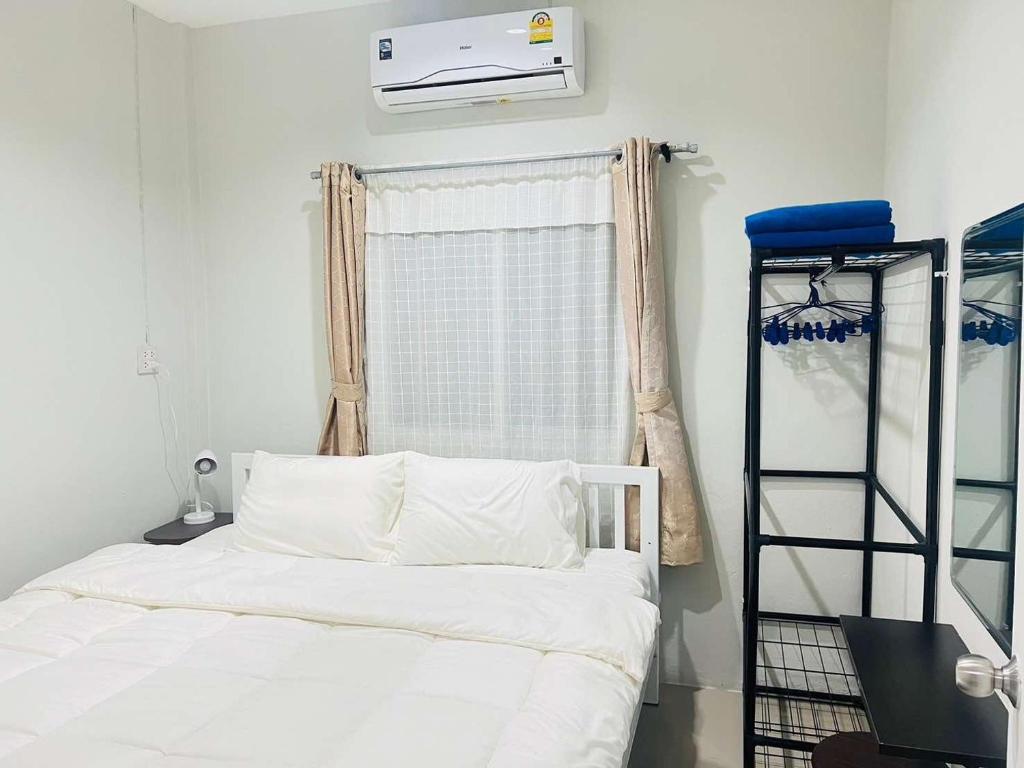 Postel nebo postele na pokoji v ubytování Yada House