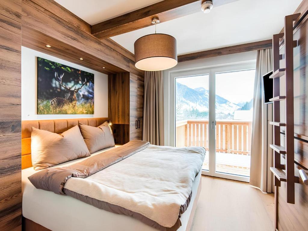 Postel nebo postele na pokoji v ubytování Apartments With Mountain View near the slopes in Rauris