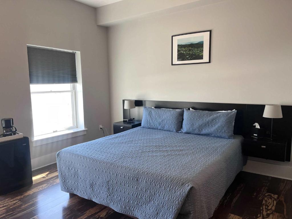 En eller flere senge i et værelse på Boutique Hotel Room 6