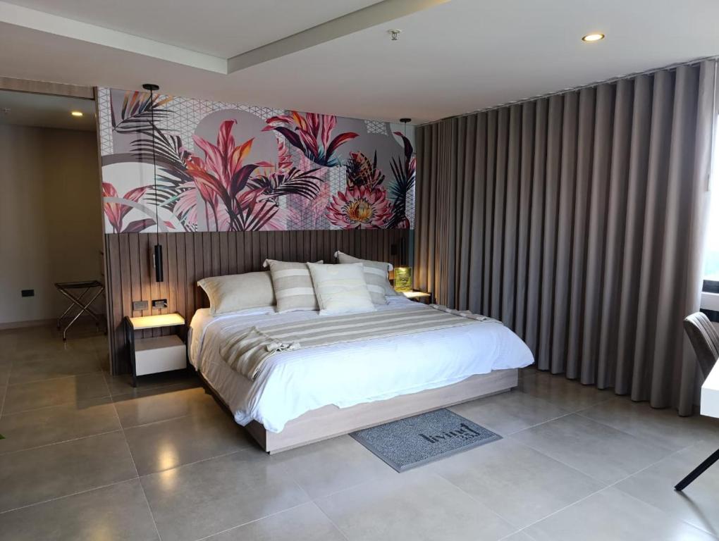 Postel nebo postele na pokoji v ubytování Hotel Living 35 Suites
