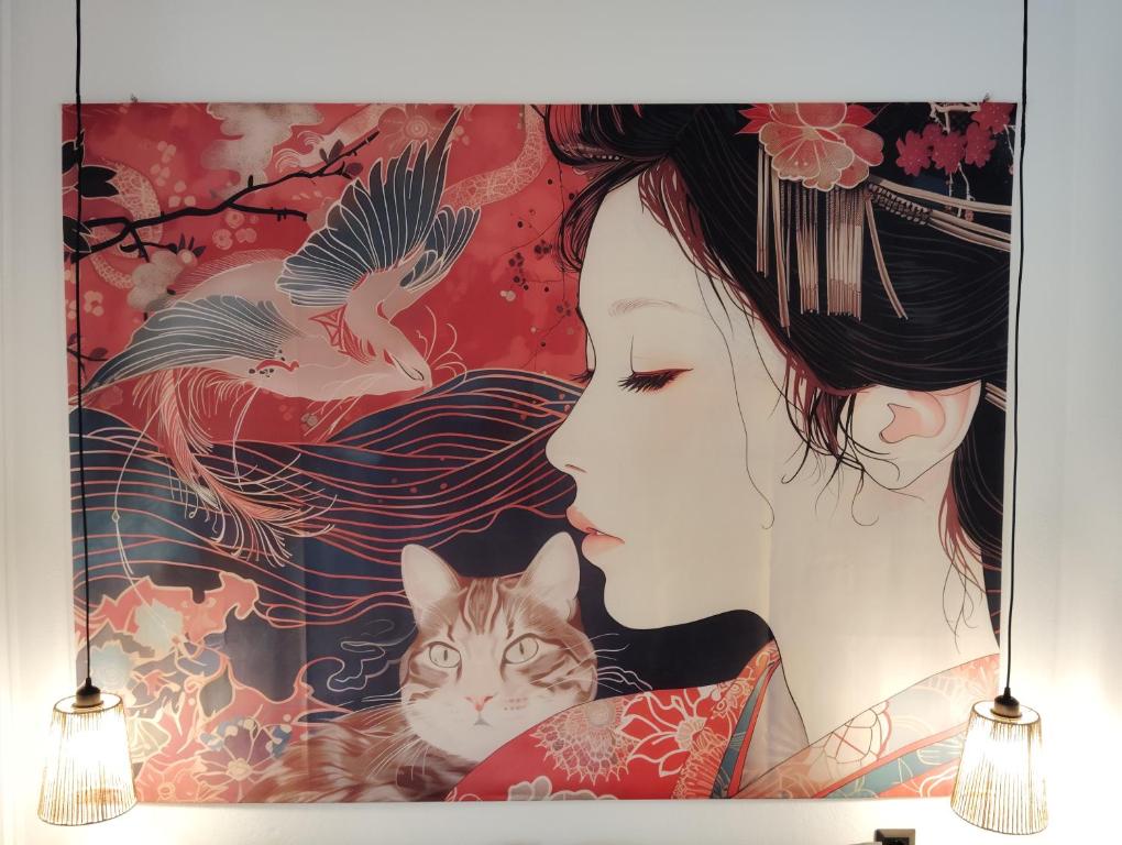 a painting of a woman with a cat and birds at Tiny Japan in Volos