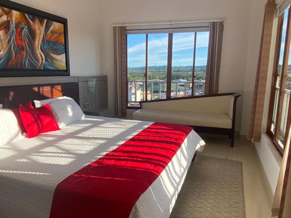 Postel nebo postele na pokoji v ubytování Hotel AMMA