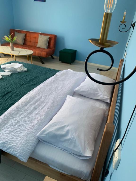 Postel nebo postele na pokoji v ubytování Mate's home Kazbegi