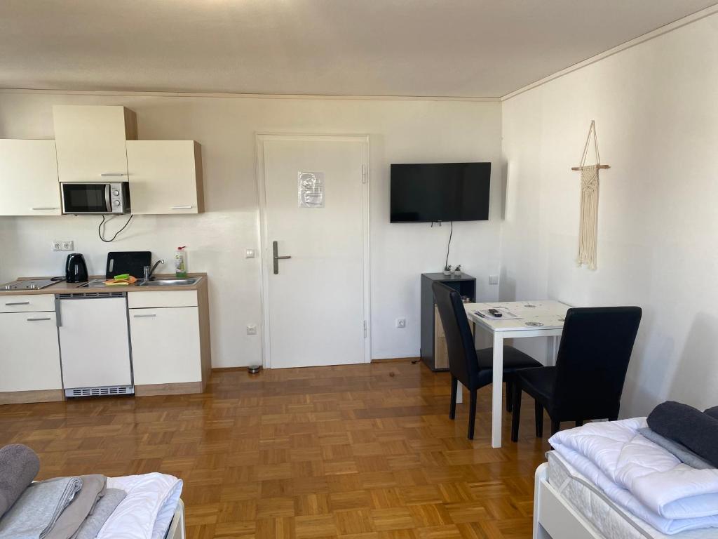 Kuchyň nebo kuchyňský kout v ubytování Apartmenthaus Selbitz
