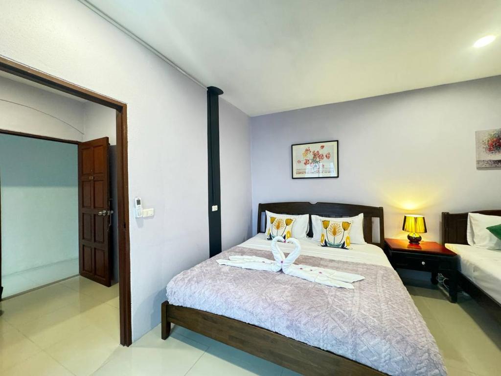 Postel nebo postele na pokoji v ubytování Pupa Rooms
