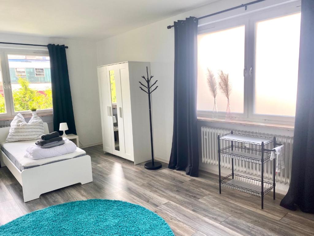 Postel nebo postele na pokoji v ubytování Apartmenthaus Selbitz