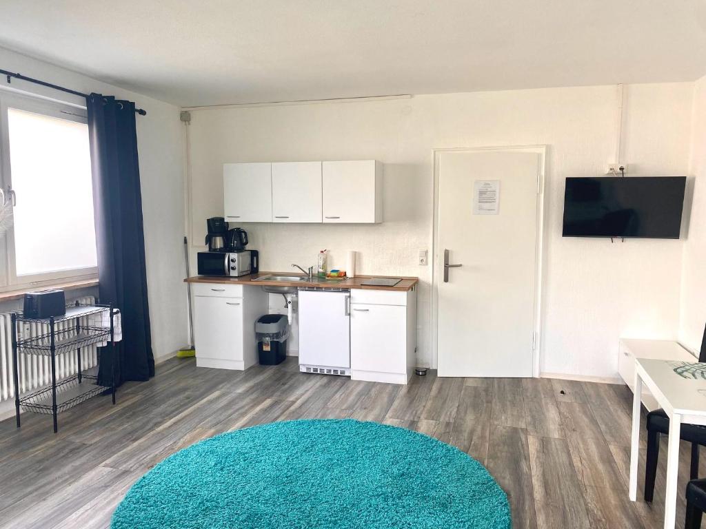 Kuchyň nebo kuchyňský kout v ubytování Apartmenthaus Selbitz