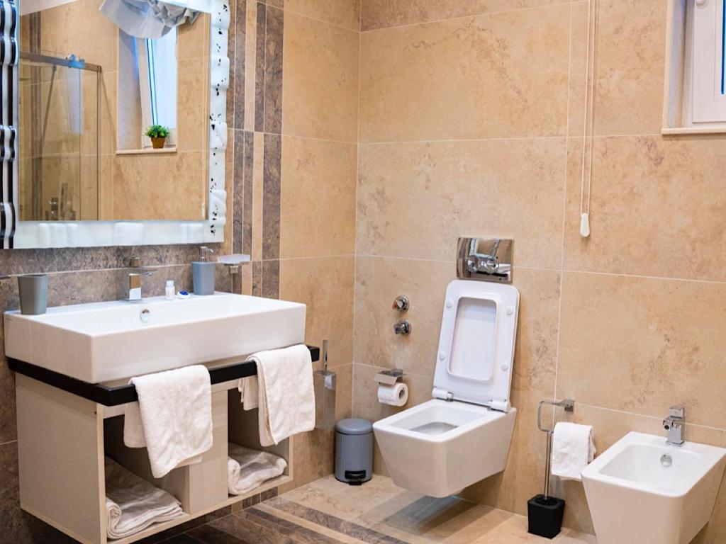Koupelna v ubytování Hotel Vila Tirana
