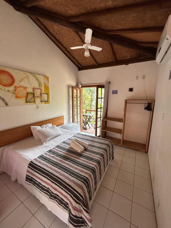 Postel nebo postele na pokoji v ubytování Pousada Costa corais