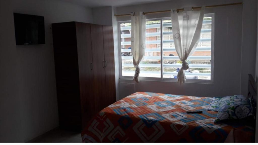 Postel nebo postele na pokoji v ubytování La trinidad