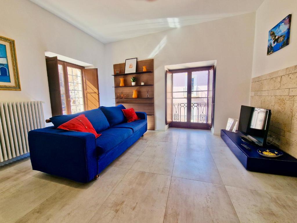 TV a/nebo společenská místnost v ubytování Casa di Aria by TraMonti Apartments