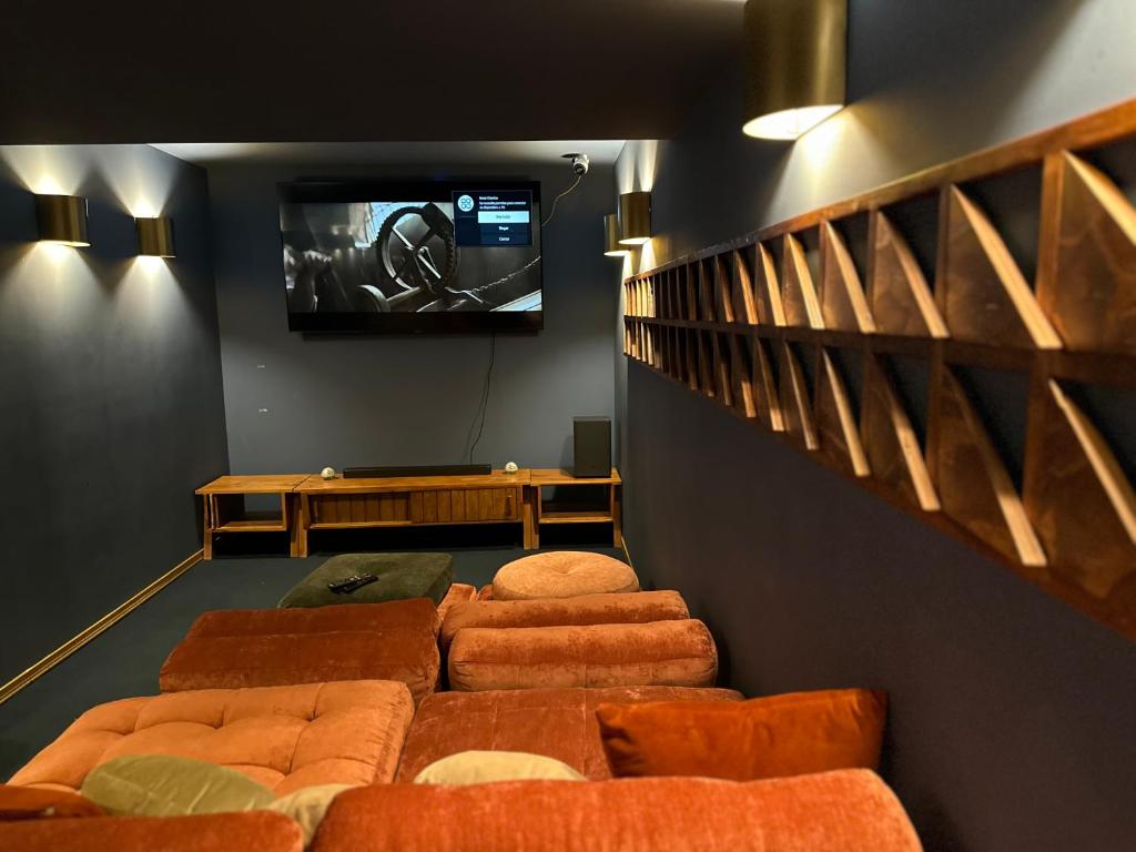 TV a/nebo společenská místnost v ubytování Hotel Olá Chapultepec