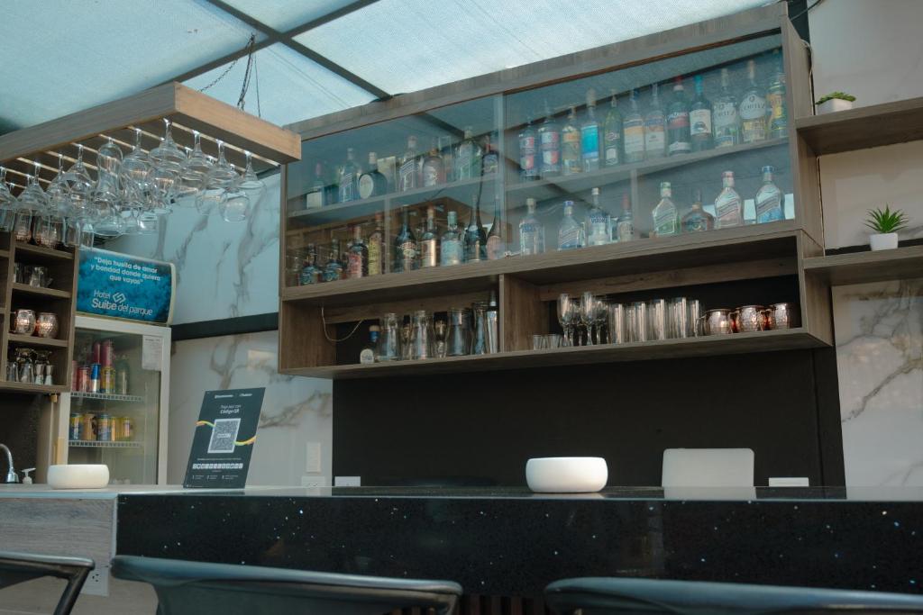 TV a/nebo společenská místnost v ubytování Hotel Laureles Plaza
