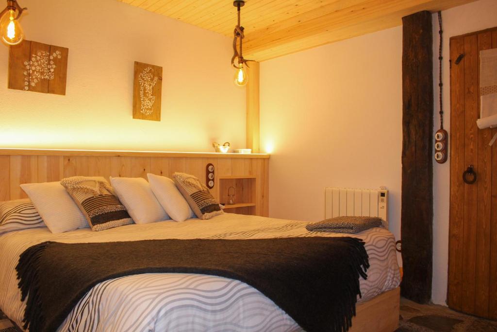 Postel nebo postele na pokoji v ubytování CASA DONDELA