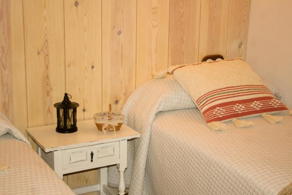 Postel nebo postele na pokoji v ubytování CASA DONDELA